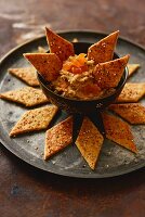 Za'atar cracker with walnuts and sheep's cheese served with date cream (Arabia)