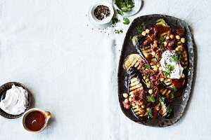 Aubergine salad with dried tomatoes, chickpeas and dates