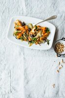 Carrots à la Provence with black olives and pine nuts
