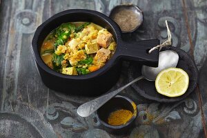 Vegetarian lentil stew with vegetables and two types of tofu