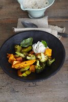 , roasted vegetables with tomato and goat's cheese cream