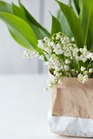 Lily of the valley in paper bag