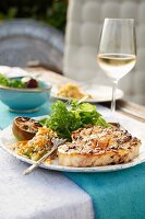 Grilled swordfish steak with lettuce and lime