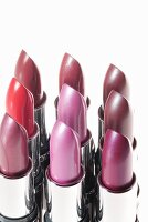 Various lipsticks in shades of red