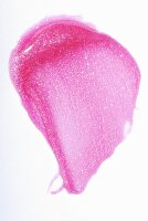 Pinkfarbener Lipgloss verstrichen auf weißem Untergrund