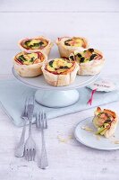 Filo tartlets with salmon, broccoli and apples
