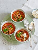 Chickpeas stew with aubergines, tomatoes and sumach yoghurt