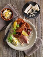 Trout fillets with beetroot cakes and horseradish