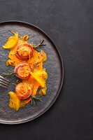 Scallops on pumpkin cream with orange and cardamom butter