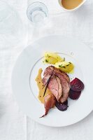 Beef stew with polenta dumplings and beetroot