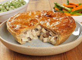 Chicken pie with potatoes and vegetables