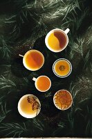 Various cups of black tea