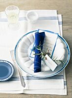 An Easter place setting with a place card and a menu