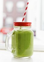 A green smoothie made with avocado and spinach