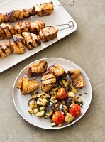 Grilled swordfish kebabs with aubergines and tomatoes