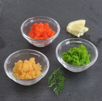Flying fish tobiko roe in glass bowls