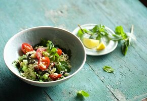 Tabbouleh with pumpkin seeds, cranberries, tomatoes and mint