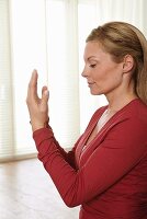 Eye exercises (Yangong, Qigong) – Step 3: move hands down following them with your eyes