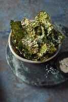 Kale crisps with sea salt in a bowl