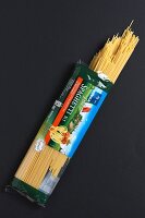 An open pack of spaghetti