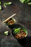 Miso soup with mushrooms and baby spinach