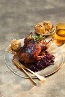 Roast duck with red cabbage and macadamia nut dumplings