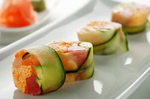 Cucumber rolls filled with tuna, crab and avocado