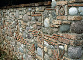 Artfully designed stone wall of pebbles