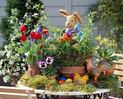 Tulips, Muscari, Primula and nest of willows