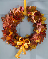 Door wreath of various autumn leaves, oaks and maple leaves