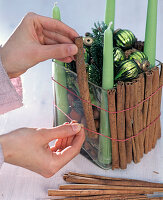 Christmas wreath with glass and cinnamon sticks,