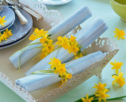 Napkin rings from narcissus flowers
