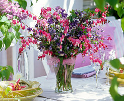 Bouquet made of Dicentra, Myosotis, Aquilegia