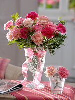 Dianthus (carnations), Pistacia (pistachio green) in glass goblet, pink bow ribbon