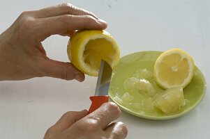 Hollowed lemons as mini vases