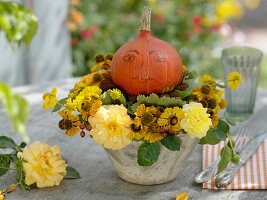 Late summer bouquet with pumpkin