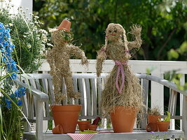 Straw dolls as balcony decoration