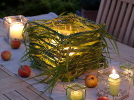 Lantern with miscanthus braided in square hare wire