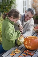 Halloween pumpkins with children