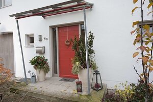 House entrance with red front door