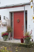 House entrance with red front door