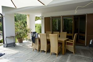 Seating group on paved terrace under roof