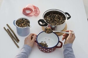 Winter food for birds in enamelled pots 1/4