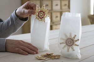 Lanterns with straw stars in sandwich bags 3/4