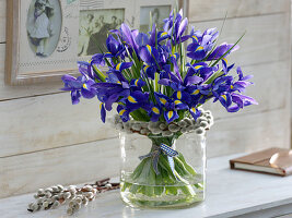 Bouquet of Iris hollandica (Hollandiris) with wreath of Salix caprea