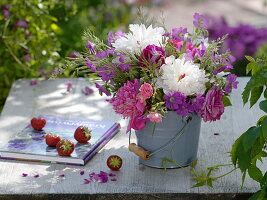 Early summer bouquet of Paeonia (peonies), Rosa (scented roses)