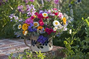 Colourful bouquet of flowers with edible blossoms