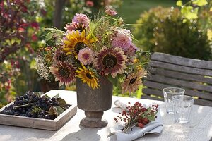 Autumn bouquet with Helianthus 'Autumn Time' (sunflowers), Dahlia