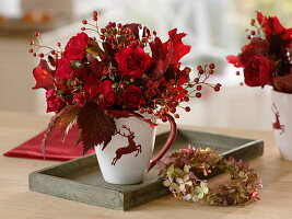 Red autumn bouquet: pink (rose, rosehips), Quercus leaves