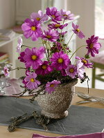 Arrangement with decorative basket and lichen-covered twigs (5/5)